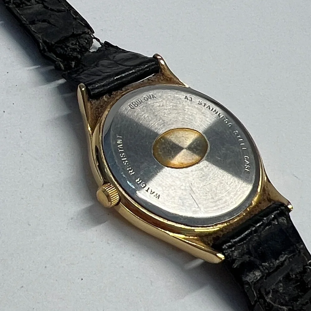 Caravelle by Bulova Vintage Quarts Watch Day Date Second Hand Function